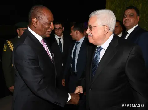 Palestinian President Mahmoud Abbas meets with Guinean President Alpha Conde, in Amman, Jordan, on November 13, 2017. Photo by Thaer Ganaim