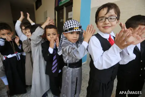 Palestinian children take part at festival of grandparents and heritage, in Gaza city on November 14, 2017. Photo by Atia Darwish
