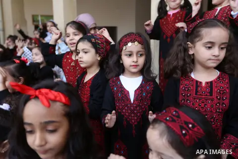 Palestinian children take part at festival of grandparents and heritage, in Gaza city on November 14, 2017. Photo by Atia Darwish