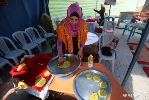 Palestinians take part at festival of grandparents and heritage, in Gaza city on November 14, 2017. Photo by Atia Darwish