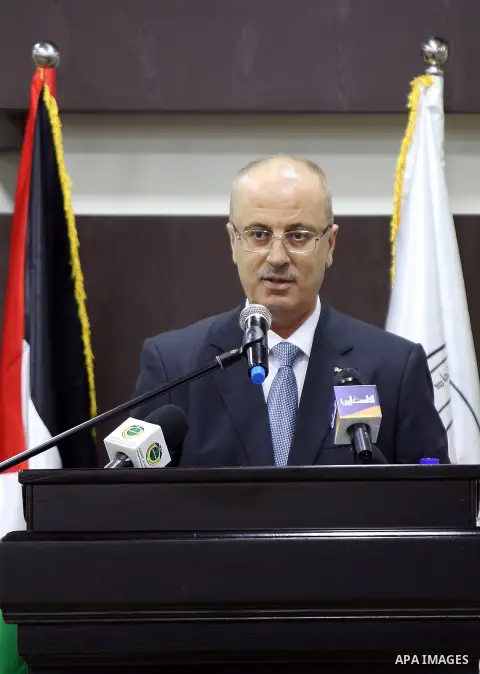 Palestinian Prime Minister, Rami Hamdallah, speaks during a general conference of the Union of Palestinian Engineers, in the West Bank city of November 16, 2017. Photo by Prime Minister Office