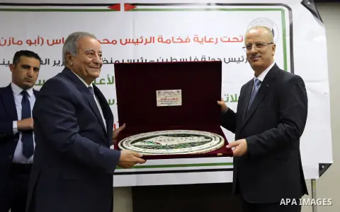 Palestinian Prime Minister, Rami Hamdallah, attends a general conference of the Union of Palestinian Engineers, in the West Bank city of November 16, 2017. Photo by Prime Minister Office