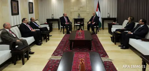 Palestinian Prime Minister, Rami Hamdallah, meets with Azzam Shawwa Governor of the Palestinian Monetary Authority, in the West Bank city of Ramallah, on Nov 19, 2017. Photo by Prime Minister Office