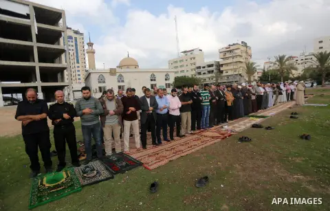 Palestinians pray for rain at al-Kateba square in Gaza City on November 19, 2017. The special Muslim prayers known as Salat al-Istisqa, it is a ritual practiced since the time of the Prophet Mohammed, are frequently held...