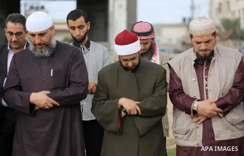 Palestinians pray for rain at al-Kateba square in Gaza City on November 19, 2017. The special Muslim prayers known as Salat al-Istisqa, it is a ritual practiced since the time of the Prophet Mohammed, are frequently held...
