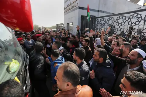 Palestinian students shout outside Rafah border crossing demanding to travel to complete their study abroad in the southern Gaza Strip on November 20, 2017, following its opening for three days for the first time since a...