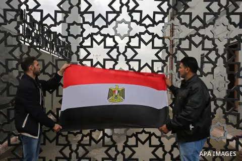 Palestinian students shout outside Rafah border crossing demanding to travel to complete their study abroad in the southern Gaza Strip on November 23, 2017. Photo by Ashraf Amra
