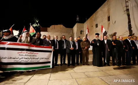 Palestinians take part in a protest in solidarity with Egyptian people after the deadly attack on a mosque in Egypt's Sinai, in the West Bank city of Bethlehem, on Nov. 25, 2017. According to latest reports, a bomb and g...