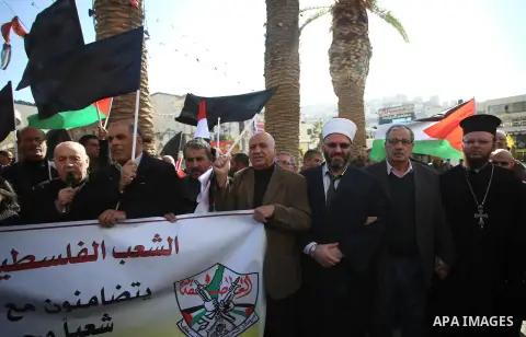Palestinians take part in a protest in solidarity with Egyptian people after the deadly attack on a mosque in Egypt's Sinai, in the West Bank city of Nablus, on Nov. 26, 2017. According to latest reports, a bomb and gunf...