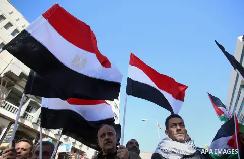 Palestinians take part in a protest in solidarity with Egyptian people after the deadly attack on a mosque in Egypt's Sinai, in the West Bank city of Nablus, on Nov. 26, 2017. According to latest reports, a bomb and gunf...