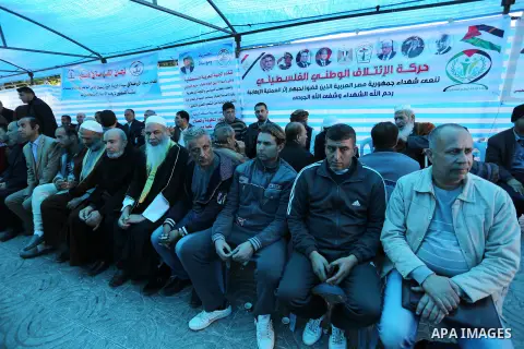 Palestinians take part in a mourning tent set up for people to pay their respects to the Egyptian victims after the deadly attack on a mosque in Egypt's Sinai, on November 26, 2017 in Gaza city. According to latest repor...