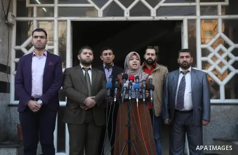A spokeswoman for human rights organizations Amina Shaat, speaks during a press conference, in Gaza city on November 28, 2017. Photo by Mohammed Asad