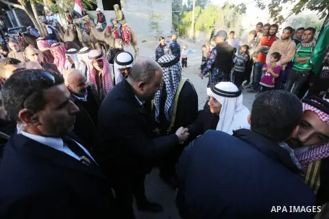 Heads of Palestinian families welcome to a delegation from Egypt’s General Intelligence in Gaza city on December 1, 2017. Photo by Mohammed Asad