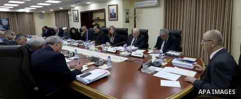 Palestinian Prime Minister, Rami hamdallah, chairs the Palestinian council meeting in the West Bank city of Ramallah on December 05, 2017. Photo by Prime Minister Office