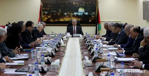Palestinian Prime Minister, Rami hamdallah, chairs the Palestinian council meeting in the West Bank city of Ramallah on December 05, 2017. Photo by Prime Minister Office