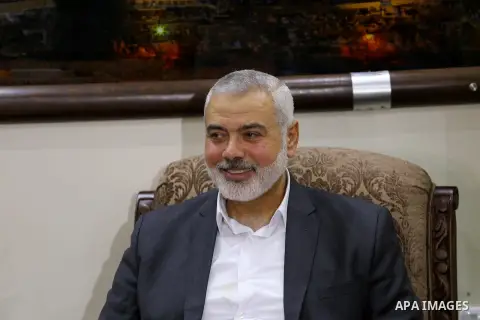 Hamas Chief Ismail Haniyeh meets with members of Palestinian factions after they returning to the Gaza Strip from Cairo, in Gaza city on December 5, 2017. Photo by Mohammed Asad