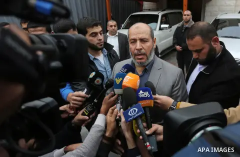 Senior Hamas leader Khalil al-Hayah speaks to the media following the meeting with members of Palestinian factions after they returning to the Gaza Strip from Cairo, in Gaza city on December 5, 2017. Photo by Mohammed As...