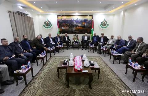 Hamas Chief Ismail Haniyeh meets with members of Palestinian factions after they returning to the Gaza Strip from Cairo, in Gaza city on December 5, 2017. Photo by Mohammed Asad