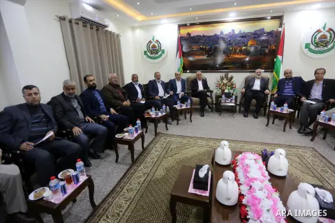 Hamas Chief Ismail Haniyeh meets with members of Palestinian factions after they returning to the Gaza Strip from Cairo, in Gaza city on December 5, 2017. Photo by Mohammed Asad