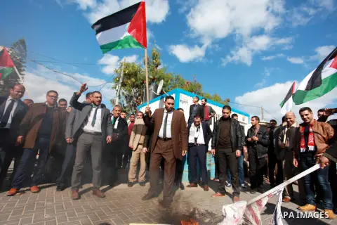 Palestinian lawyers take part in a protest following Trump's decision to recognise Jerusalem as the capital of Israel, in front of the headquarter United Nation "UNSCO" in Gaza City, on December 7, 2017. Photo by Mahmoud...