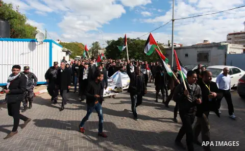Palestinian lawyers take part in a protest following Trump's decision to recognise Jerusalem as the capital of Israel, in front of the headquarter United Nation "UNSCO" in Gaza City, on December 7, 2017. Photo by Mahmoud...
