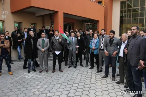 Palestinian lawyers take part in a protest following Trump's decision to recognise Jerusalem as the capital of Israel, in front of the headquarter United Nation "UNSCO" in Gaza City, on December 7, 2017. Photo by Mahmoud...