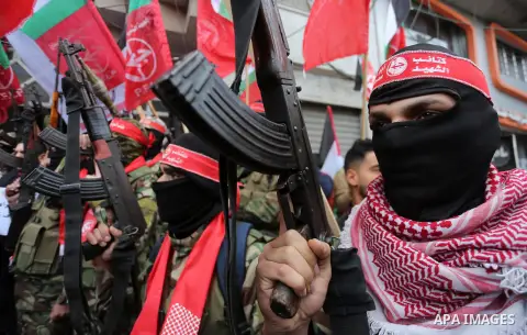 Palestinian militants from the Popular Front for the Liberation of Palestine (PFLP) take part in a protest following Trump's decision to recognise Jerusalem as the capital of Israel, in Gaza City, on December 7, 2017. Ph...