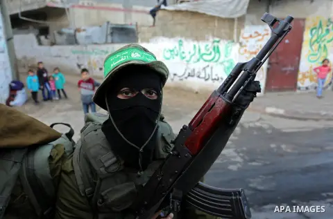 Palestinian Hamas militants take part in a protest against U.S. President Donald Trump's decision to recognize Jerusalem as the capital of Israel in the northern Gaza Strip December 7, 2017. Photo by Ashraf Amra