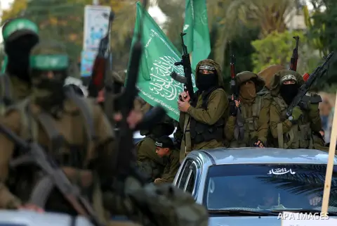 Palestinian Hamas militants take part in a protest against U.S. President Donald Trump's decision to recognize Jerusalem as the capital of Israel in the northern Gaza Strip December 7, 2017. Photo by Ashraf Amra