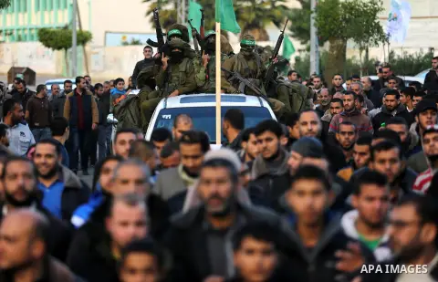 Palestinian Hamas militants take part in a protest against U.S. President Donald Trump's decision to recognize Jerusalem as the capital of Israel in the northern Gaza Strip December 7, 2017. Photo by Ashraf Amra