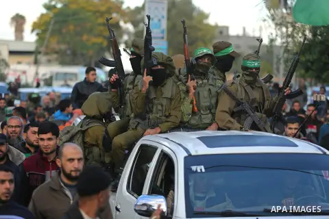 Palestinian Hamas militants take part in a protest against U.S. President Donald Trump's decision to recognize Jerusalem as the capital of Israel in the northern Gaza Strip December 7, 2017. Photo by Ashraf Amra