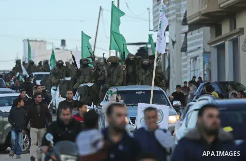 Palestinian Hamas militants take part in a protest against U.S. President Donald Trump's decision to recognize Jerusalem as the capital of Israel in the northern Gaza Strip December 7, 2017. Photo by Ashraf Amra