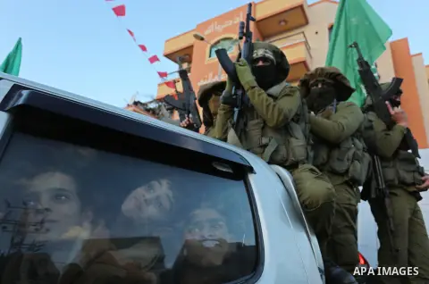 Palestinian Hamas militants take part in a protest against U.S. President Donald Trump's decision to recognize Jerusalem as the capital of Israel in the northern Gaza Strip December 7, 2017. Photo by Ashraf Amra