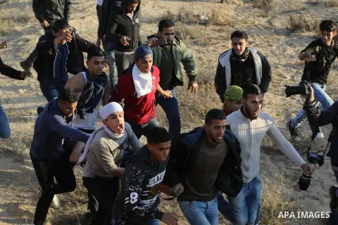 Palestinian protesters clash with Israeli forces at the Bureij refugee camp, in central Gaza on December 8, 2017. Palestinians clashed with Israeli security forces after calls for a "day of rage" as US President Donald T...