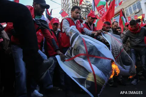 Palestinian supporters of the Popular Front for the Liberation of Palestine (PFLP) take part in a protest against US President Donald Trump's decision to recognise Jerusalem as the capital of Israel, in Gaza city on Dece...