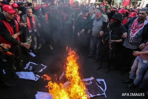 Palestinian supporters of the Popular Front for the Liberation of Palestine (PFLP) take part in a protest against US President Donald Trump's decision to recognise Jerusalem as the capital of Israel, in Gaza city on Dece...