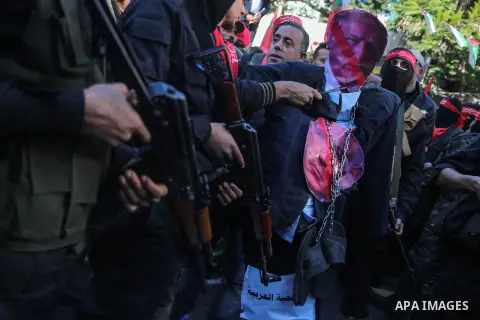 Palestinian supporters of the Popular Front for the Liberation of Palestine (PFLP) take part in a protest against US President Donald Trump's decision to recognise Jerusalem as the capital of Israel, in Gaza city on Dece...