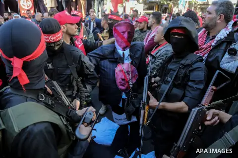 Palestinian supporters of the Popular Front for the Liberation of Palestine (PFLP) take part in a protest against US President Donald Trump's decision to recognise Jerusalem as the capital of Israel, in Gaza city on Dece...