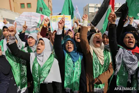 Palestinian students take part in a protest against US President Donald Trump's decision to recognise Jerusalem as the capital of Israel, in Gaza city on December 10, 2017. Photo by Ashraf Amra