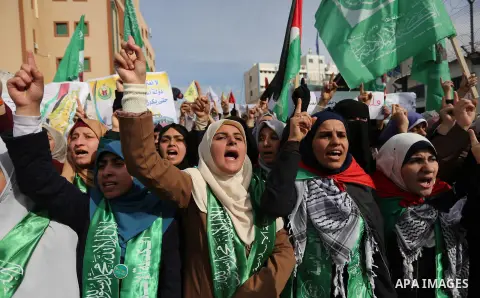 Palestinian students take part in a protest against US President Donald Trump's decision to recognise Jerusalem as the capital of Israel, in Gaza city on December 10, 2017. Photo by Ashraf Amra