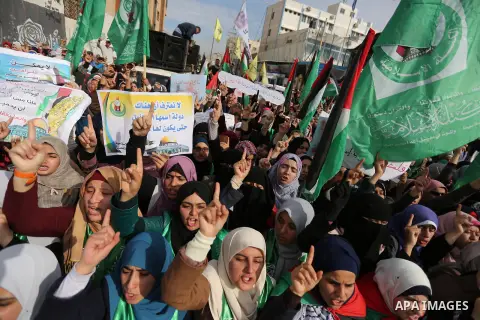 Palestinian students take part in a protest against US President Donald Trump's decision to recognise Jerusalem as the capital of Israel, in Gaza city on December 10, 2017. Photo by Ashraf Amra