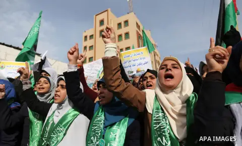 Palestinian students take part in a protest against US President Donald Trump's decision to recognise Jerusalem as the capital of Israel, in Gaza city on December 10, 2017. Photo by Ashraf Amra
