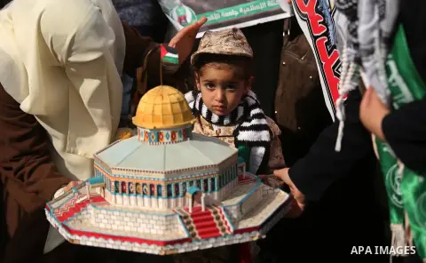 Palestinian students take part in a protest against US President Donald Trump's decision to recognise Jerusalem as the capital of Israel, in Gaza city on December 10, 2017. Photo by Ashraf Amra