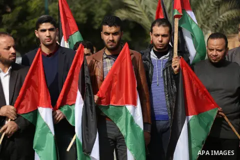 Palestinian journalists take part in a protest against US President Donald Trump's decision to recognise Jerusalem as the capital of Israel, in Gaza city on December 10, 2017. Photo by Mohammed Asad