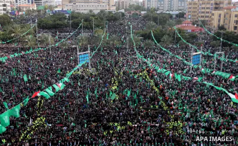 Palestinian Hamas supporters attend a rally marking the 30th anniversary of the founding of the Hamas movement, in Gaza city, December 14, 2017. Photo by Mohammed Asad