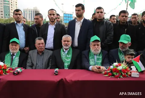 Palestinian Hamas supporters attend a rally marking the 30th anniversary of the founding of the Hamas movement, in Gaza city, December 14, 2017. Photo by Ashraf Amra
