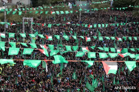 Palestinian Hamas supporters attend a rally marking the 30th anniversary of the founding of the Hamas movement, in Gaza city, December 14, 2017. Photo by Ashraf Amra