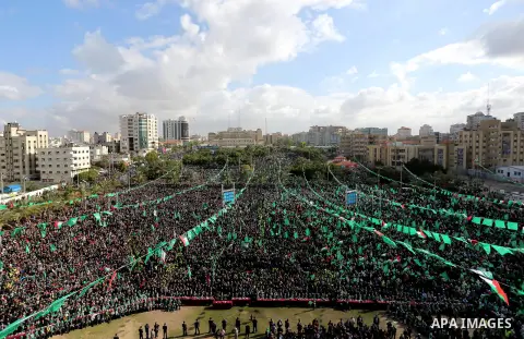 Palestinian Hamas supporters attend a rally marking the 30th anniversary of the founding of the Hamas movement, in Gaza city, December 14, 2017. Photo by Ashraf Amra