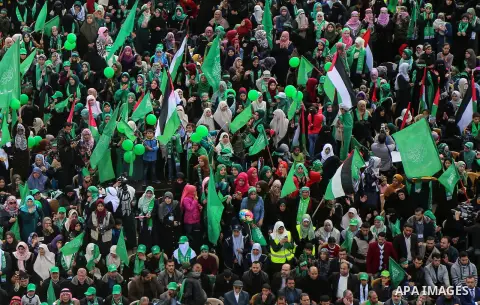 Palestinian Hamas supporters attend a rally marking the 30th anniversary of the founding of the Hamas movement, in Gaza city, December 14, 2017. Photo by Mohammed Dahman