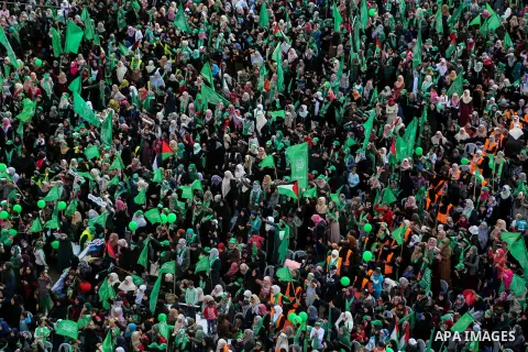 Palestinian Hamas supporters attend a rally marking the 30th anniversary of the founding of the Hamas movement, in Gaza city, December 14, 2017. Photo by Mohammed Dahman